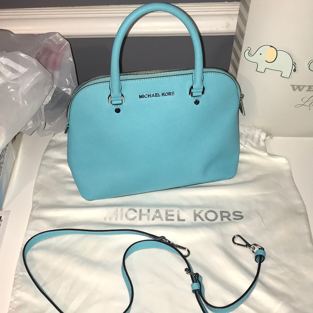 BABY BLUE/ TEAL MICHAEL KORS BAG